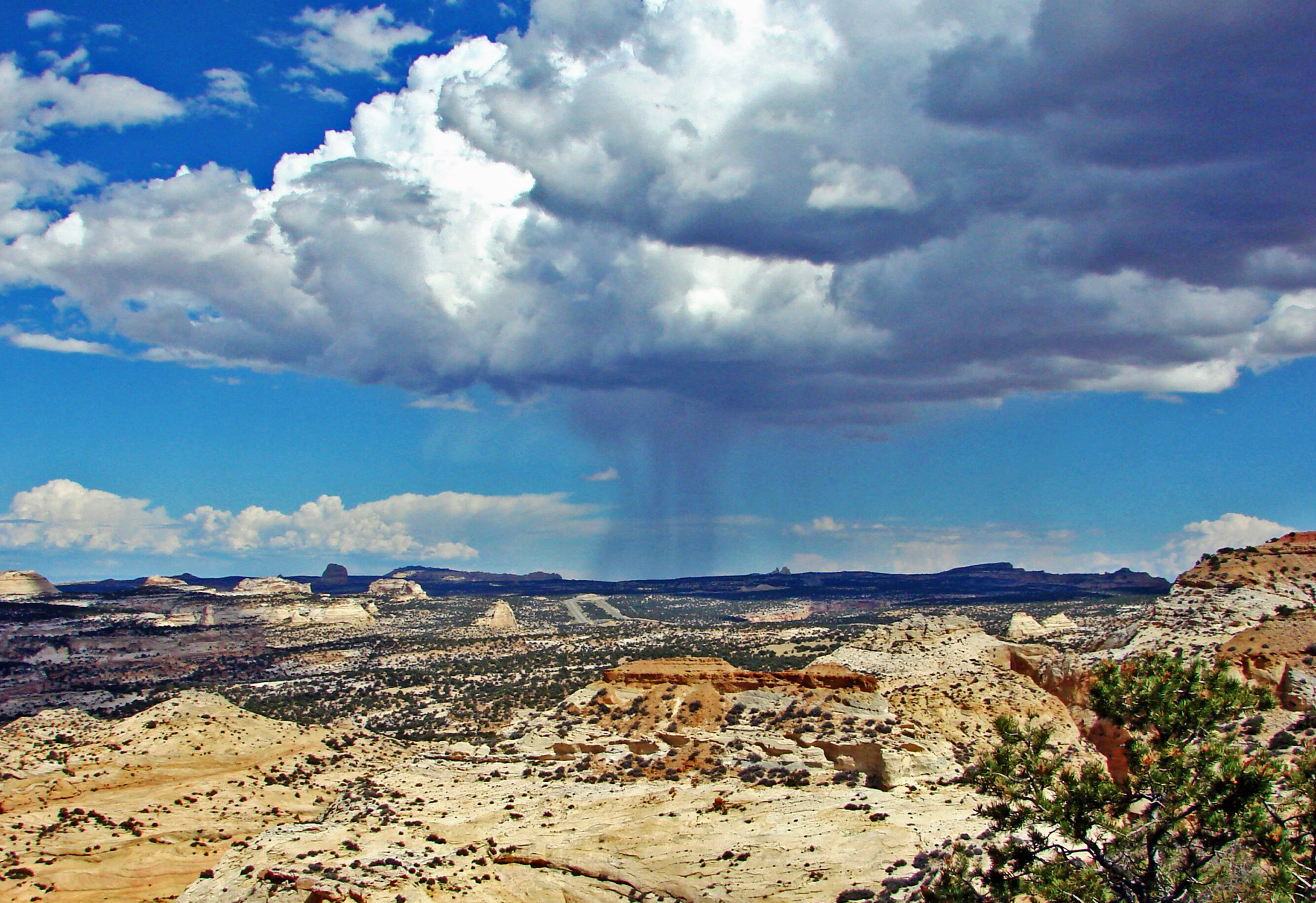 Monsoon rain falling across the San Rafael Swell badlands west of Green River